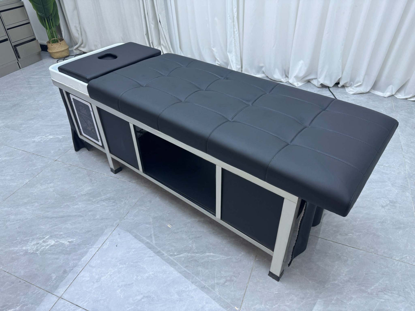 Side view of the Japanese Scalp Massage Bed highlighting its plush design and support.