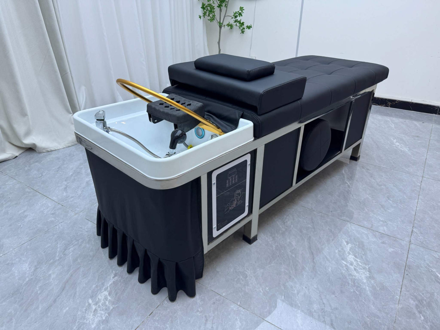 Wellness room showcasing the Japanese Scalp Massage Bed with adjustable headrest.