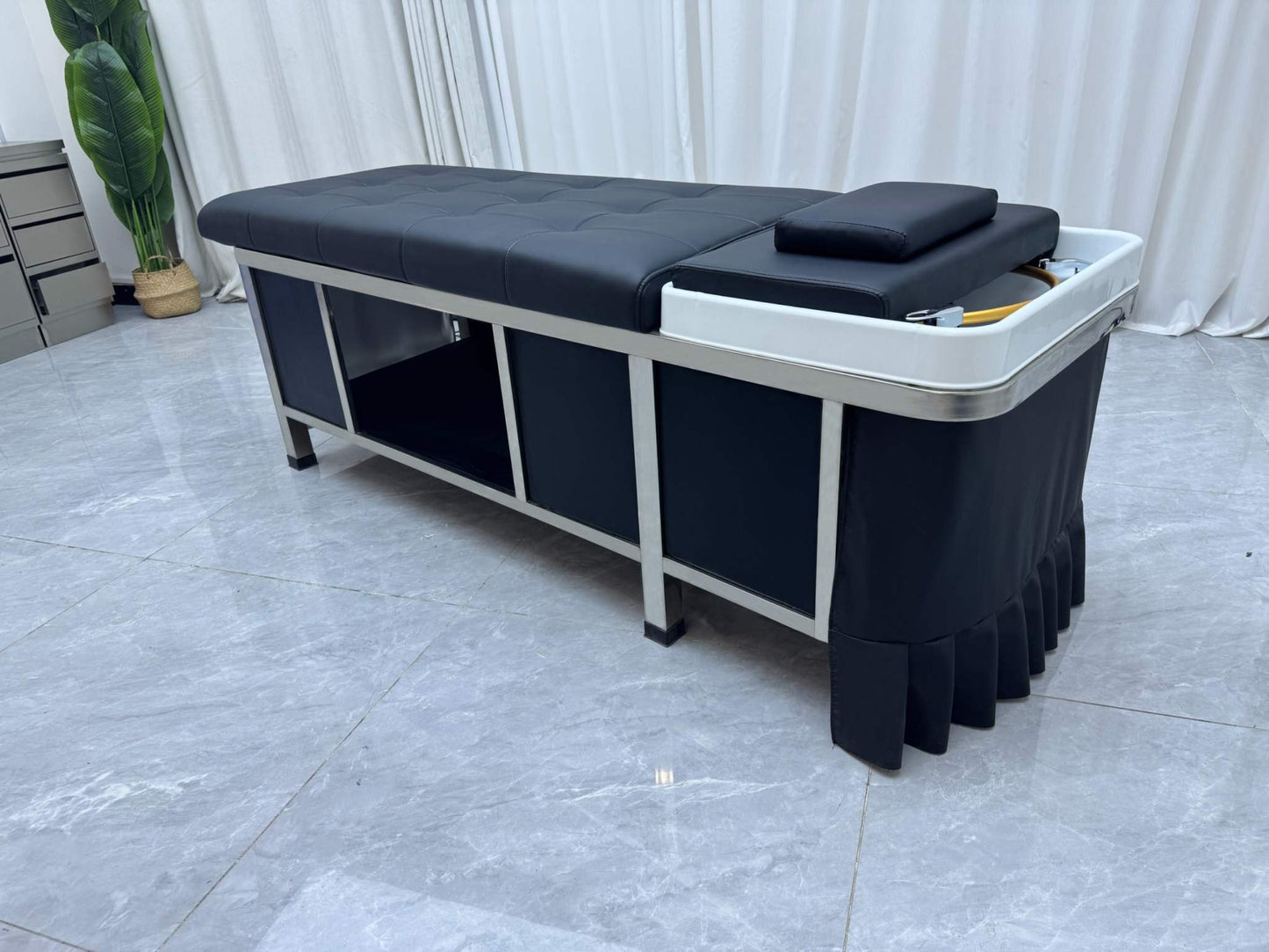 Sleek and modern Japanese Scalp Massage Bed enhancing beauty and body services.