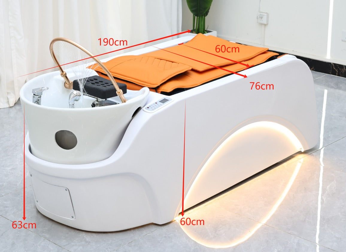 White high-end scalp massage bed featuring orange comfort pads and a transparent dome.