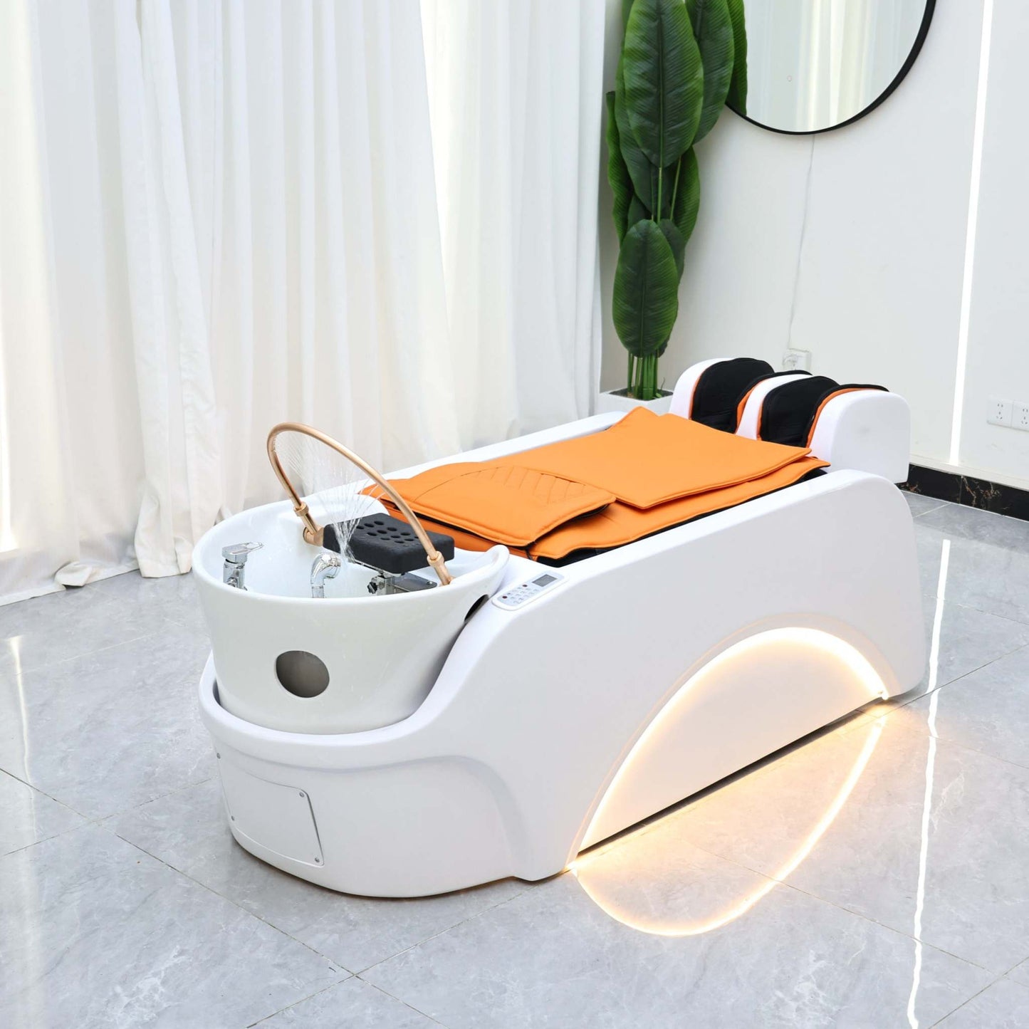 Modern scalp therapy bed with LED accents, designed for professional beauty treatments.