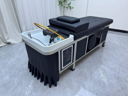 Wellness room showcasing the Japanese Scalp Massage Bed with adjustable headrest.