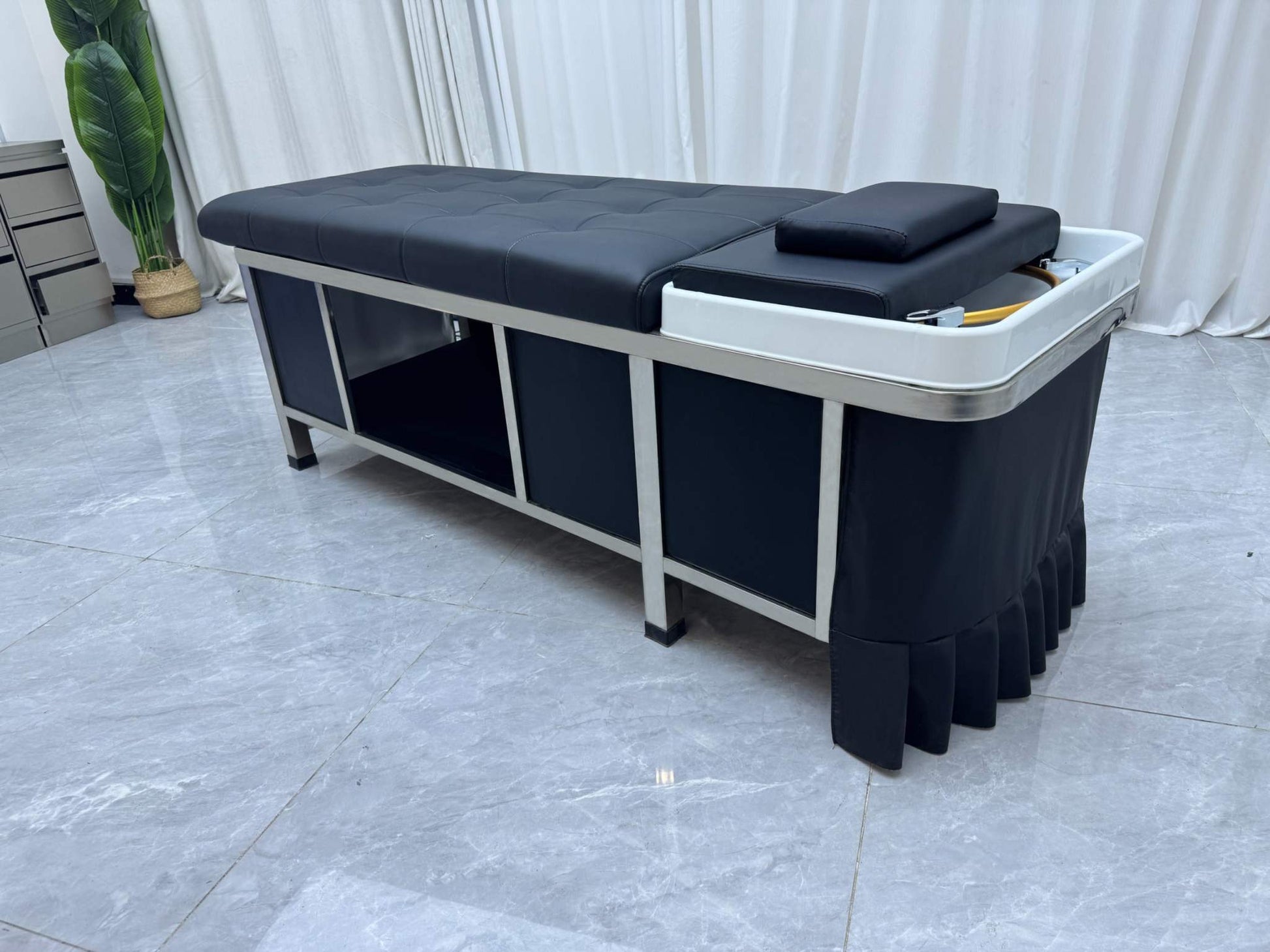 Sleek and modern Japanese Scalp Massage Bed enhancing beauty and body services.