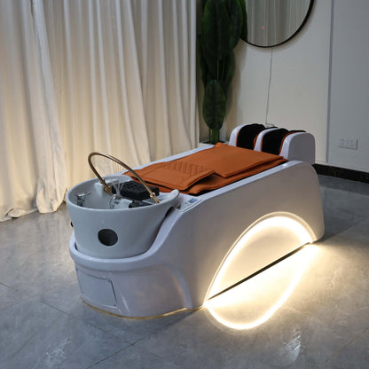 Innovative spa bed for scalp therapy with ergonomic curves and luxury detailing.