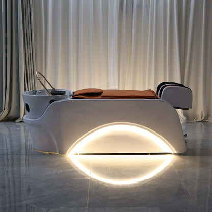 Professional scalp treatment station with comfort mat, LED glow, and clear dome headpiece.
