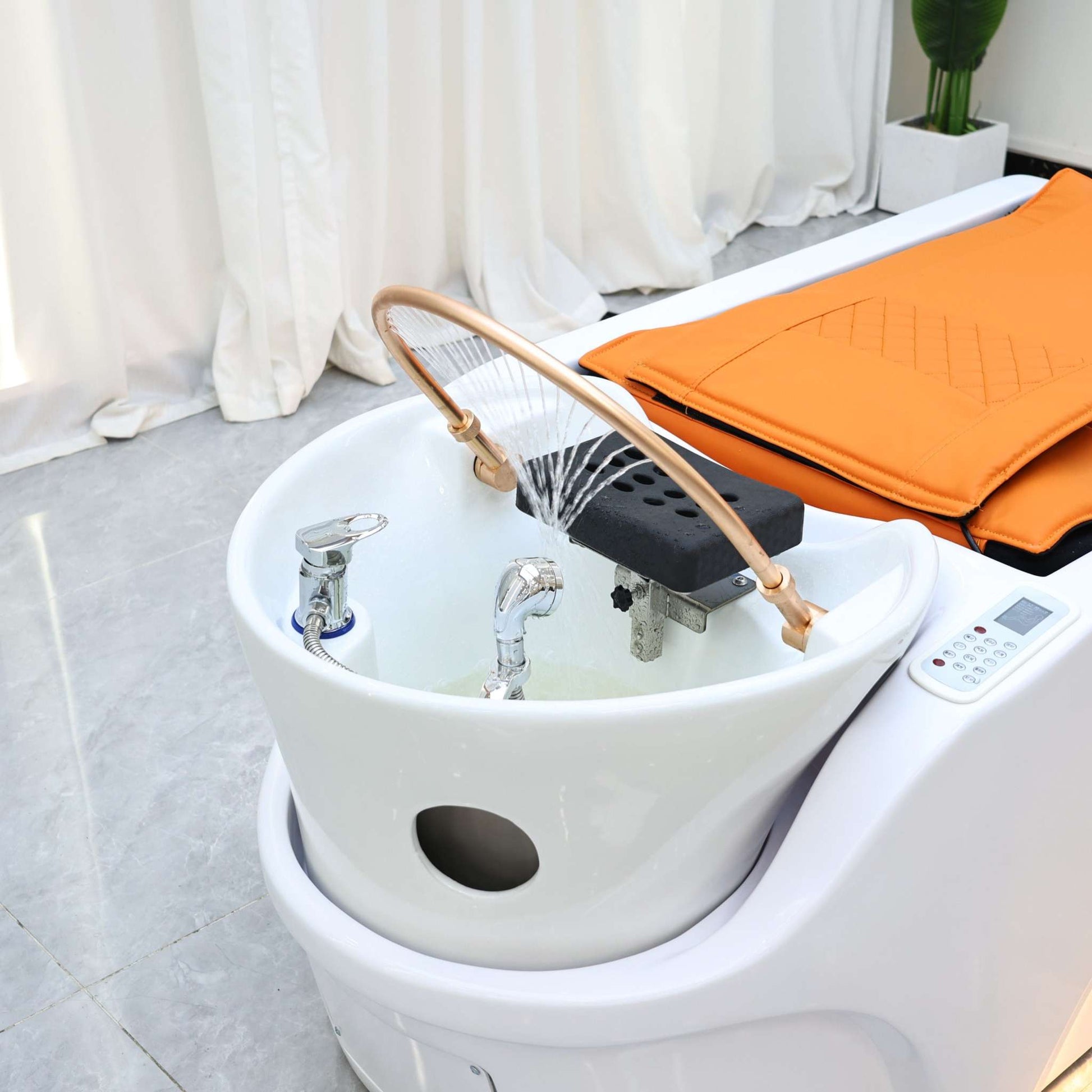 Futuristic luxury massage bed with heated mat and scalp treatment dome in spa setting.